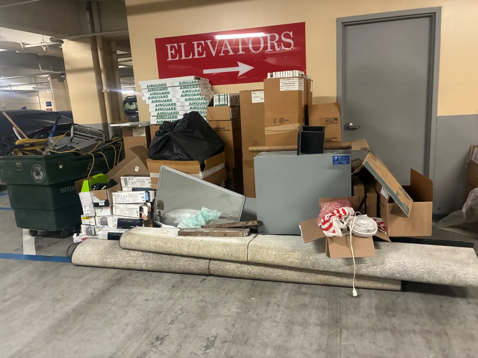 Commercial building junk staged by the elevators